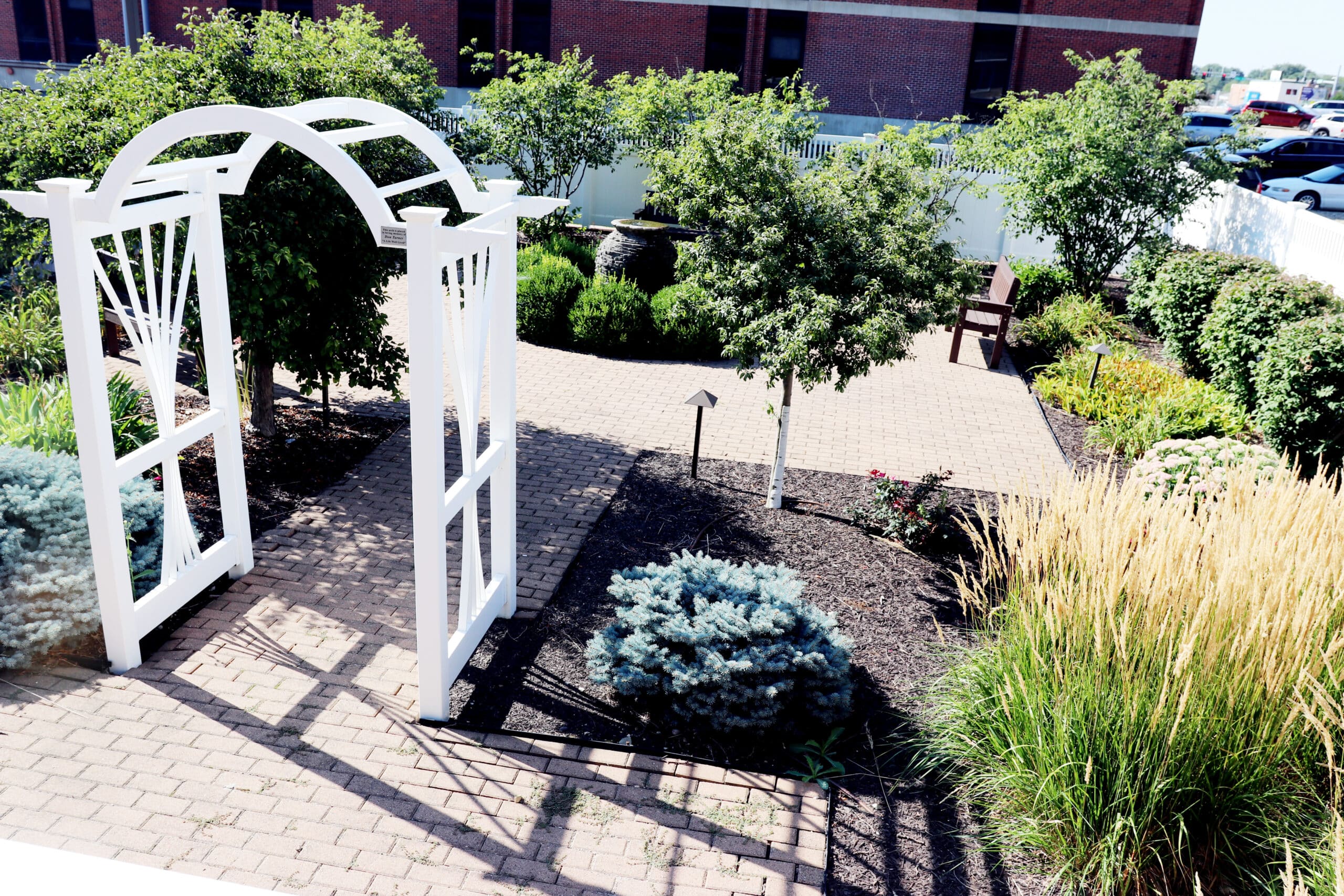 garden area with white arch