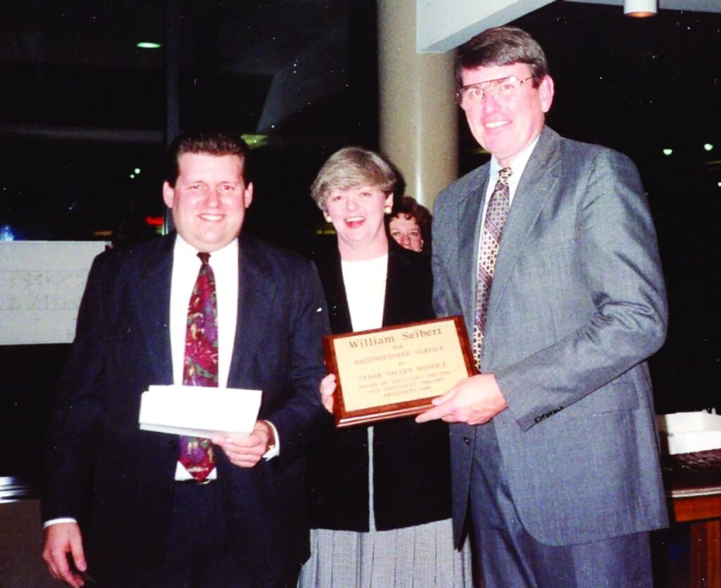Steve Jordan, lady, Bill Siebert receives award