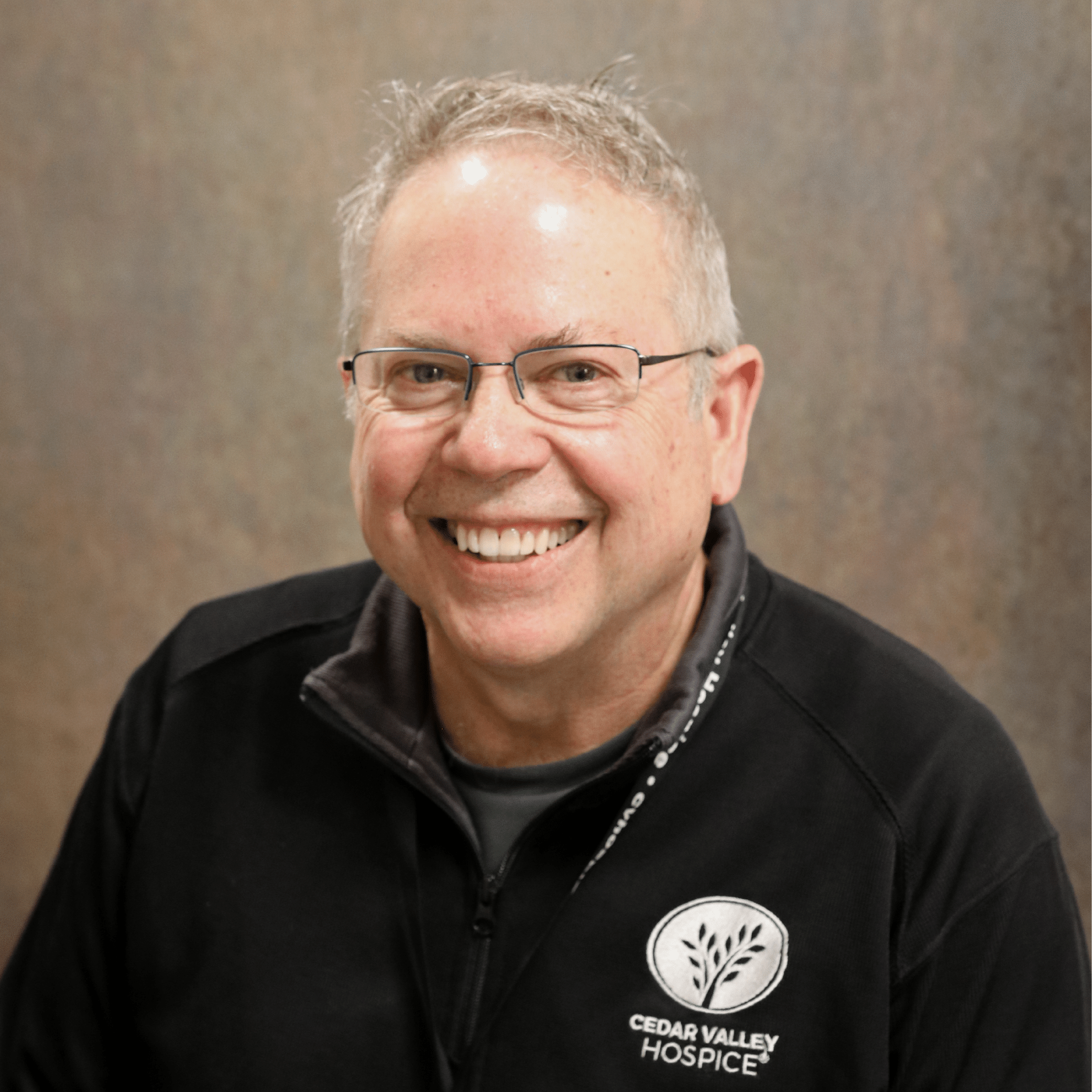 Headshot of chief medical director Dr. John Zehr