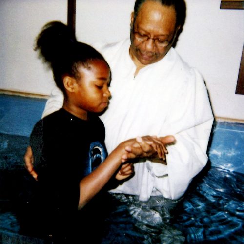 Ted baptizes granddaughter